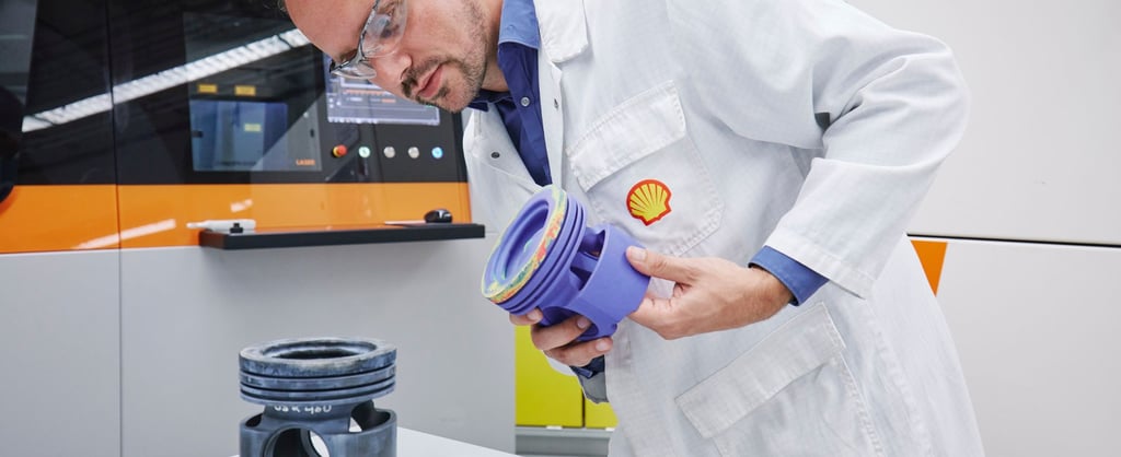 A Shell employee working on a 3D printing project