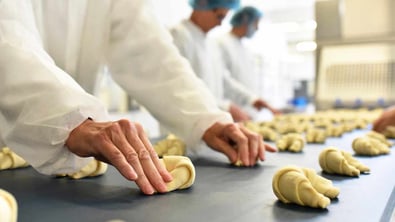 Making pastries in warehouse