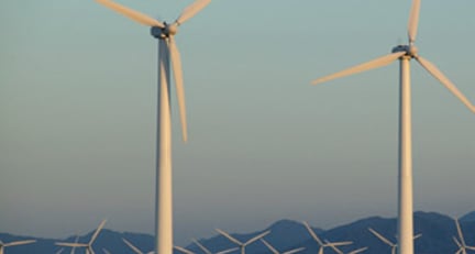 Onshore wind farm in moody lighting