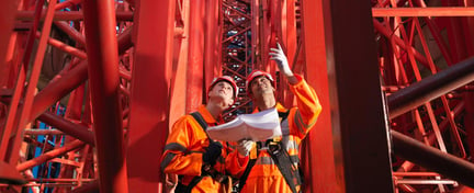 Crane workers communicating